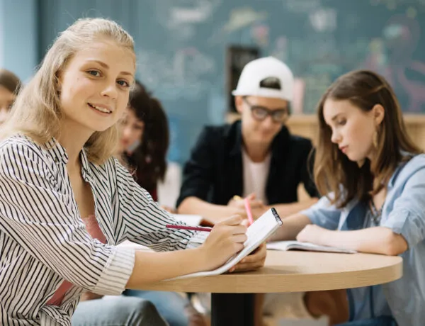 smiling-teenage-student-girl by .